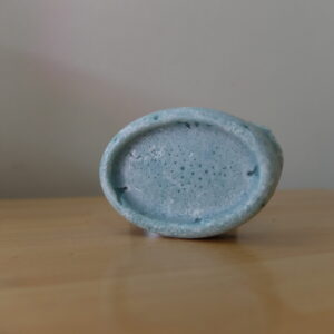 Oval soap in a greyish blue shade