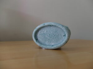 Oval shaped soap in greyish blue